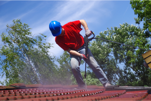 Hampton House roof cleaning with pressure tool